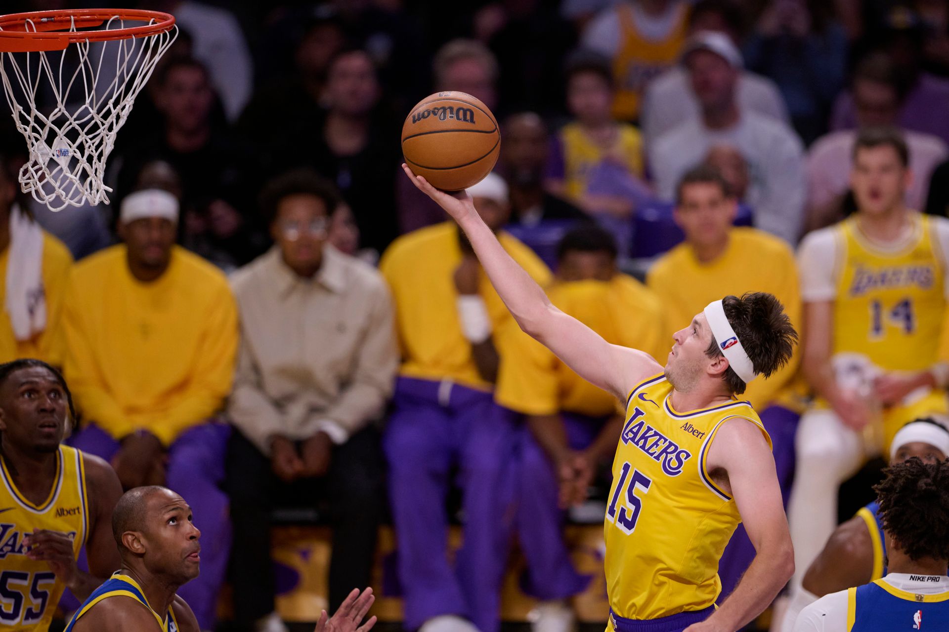 Austin Reaves shoots against Golden State