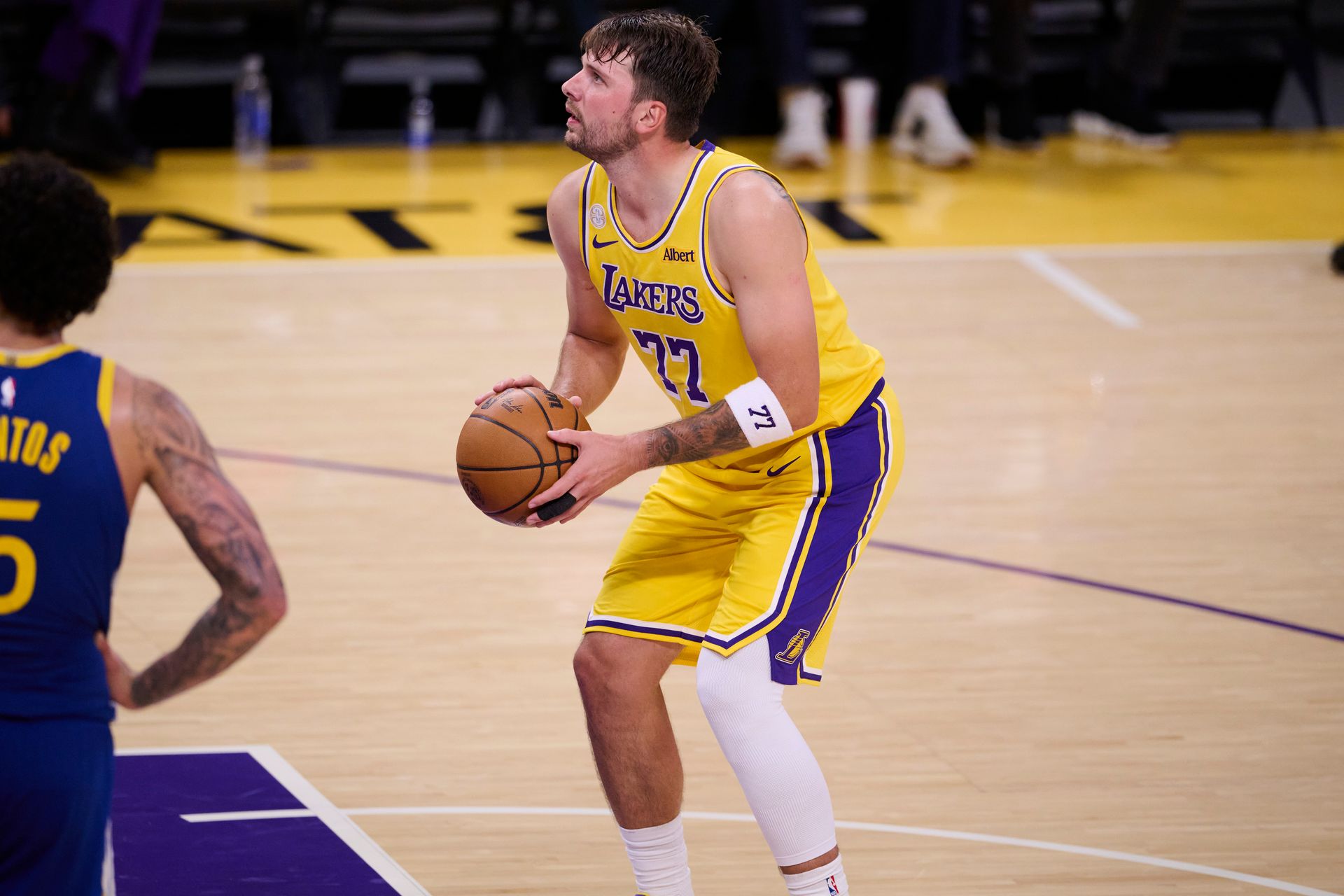 Luka Doncic shoots against the Warriors