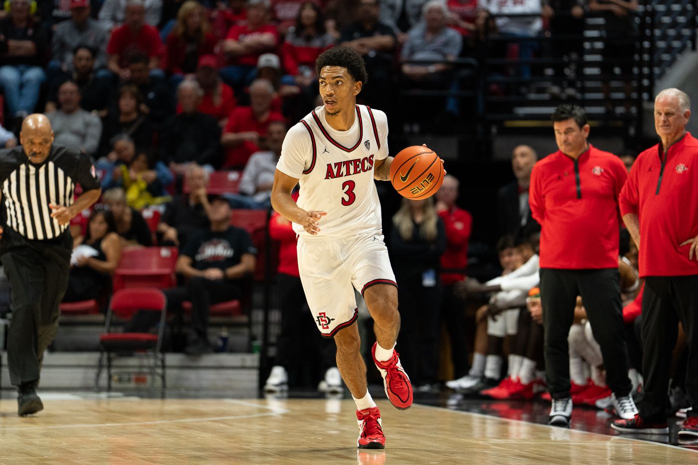 Ezlie Harrington advances the ball against USC
