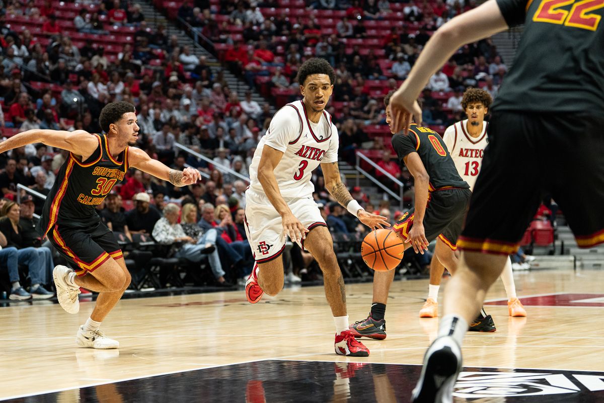 Ezlie Harrington pushes the ball upcourt