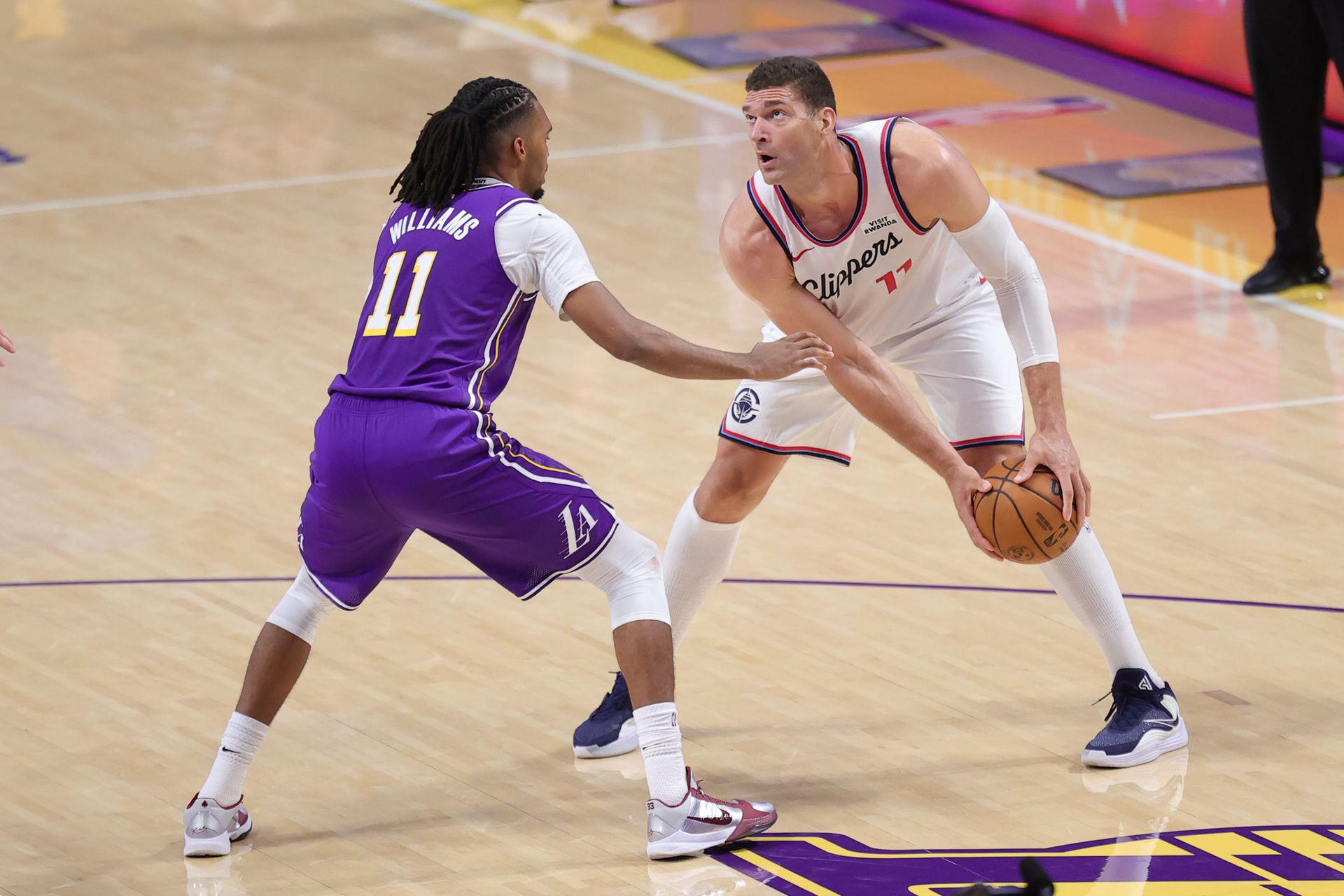 Brook Lopez posts up against the Lakers