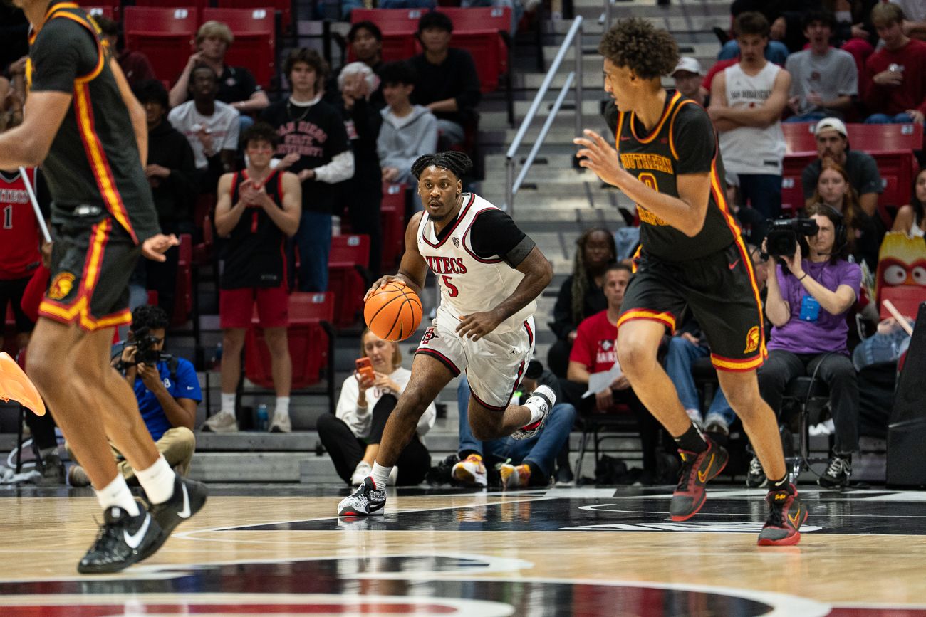 Latrell Davis drives into the USC defense