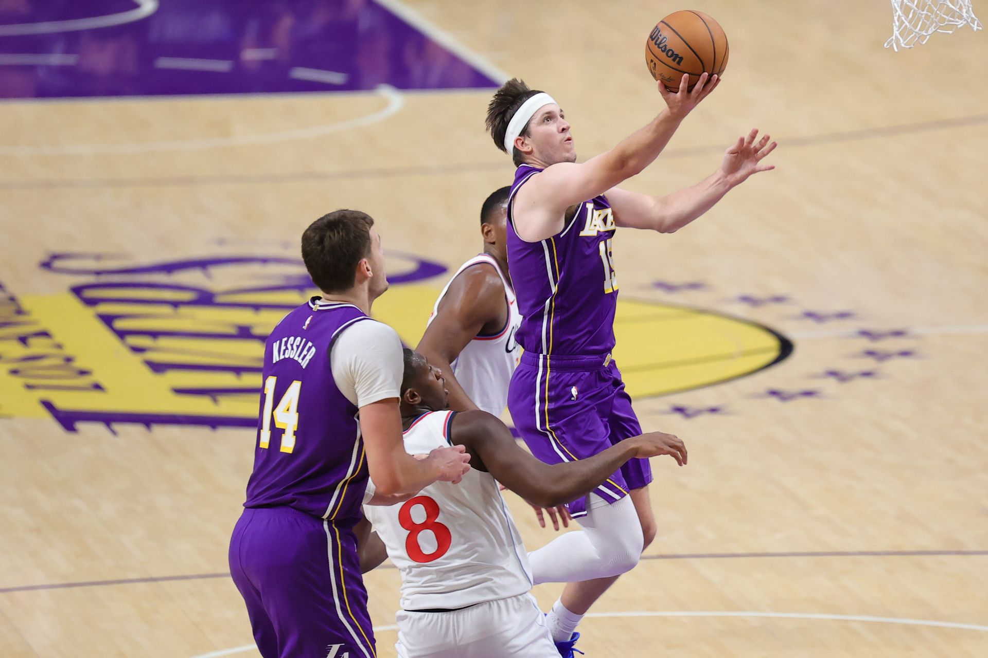 Austin Reaves shoots a layup against the Clippers