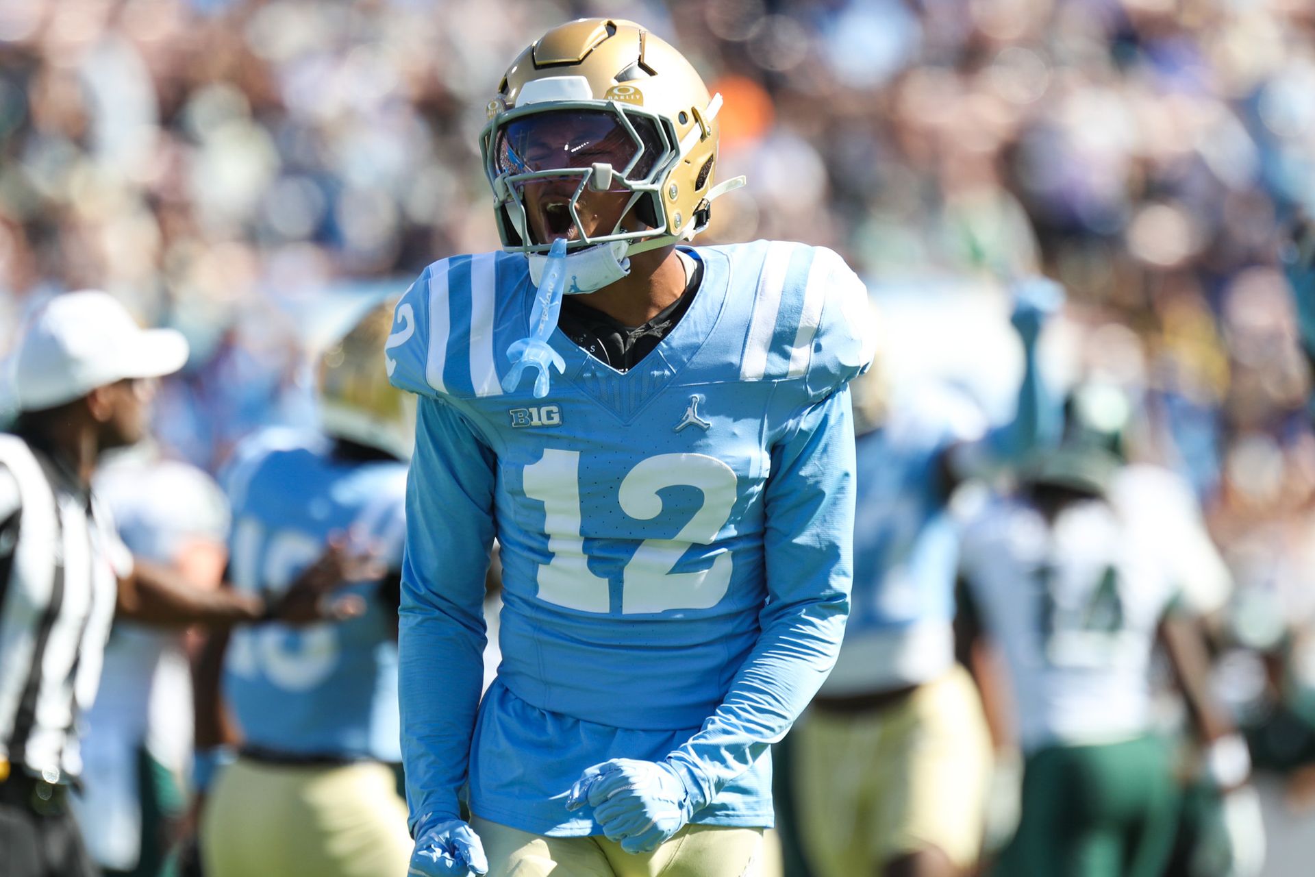 Malik Hartford Celebrates UCLA Turnover Against Michigan State