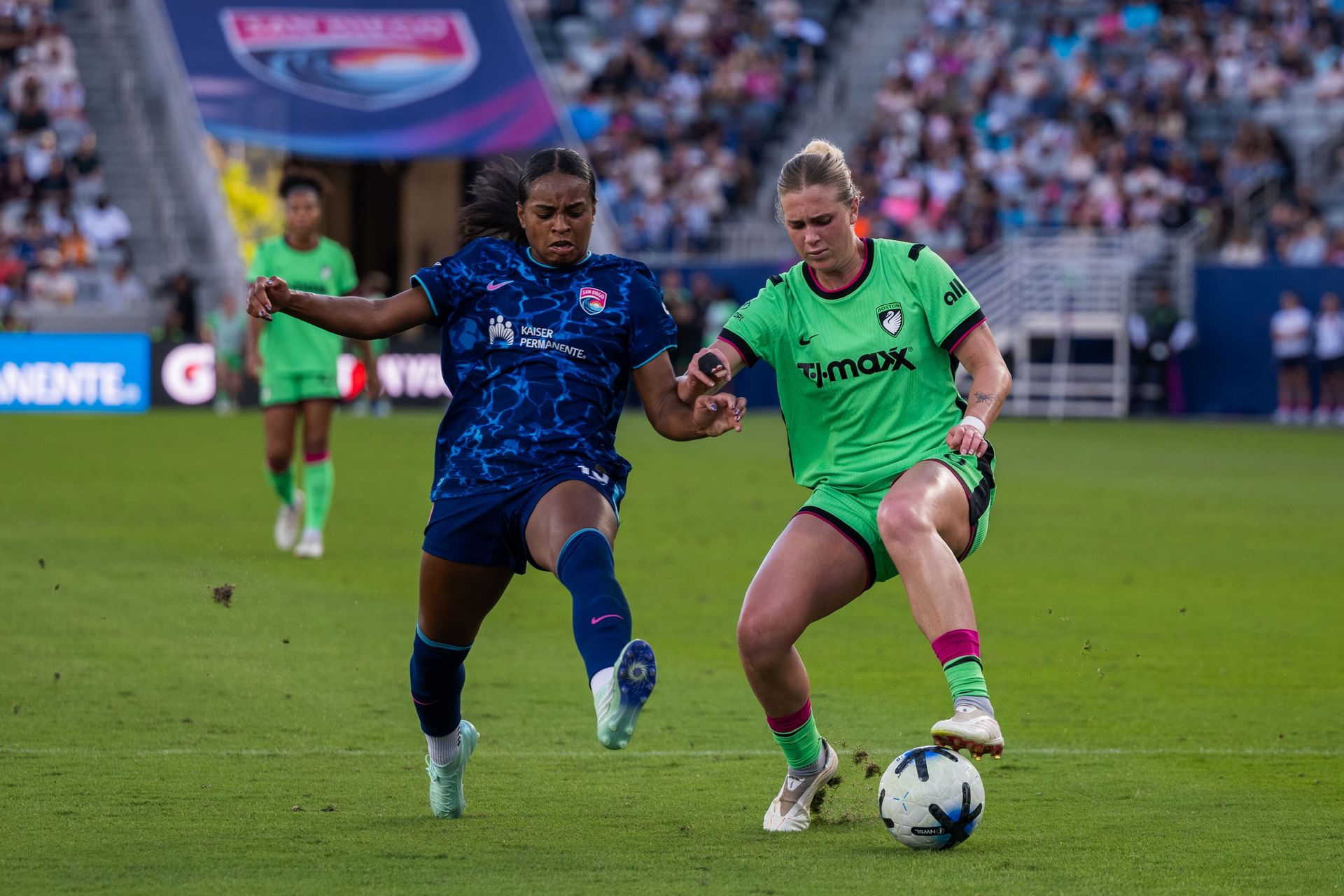 Trinity Byars battles Annie Karich for possession