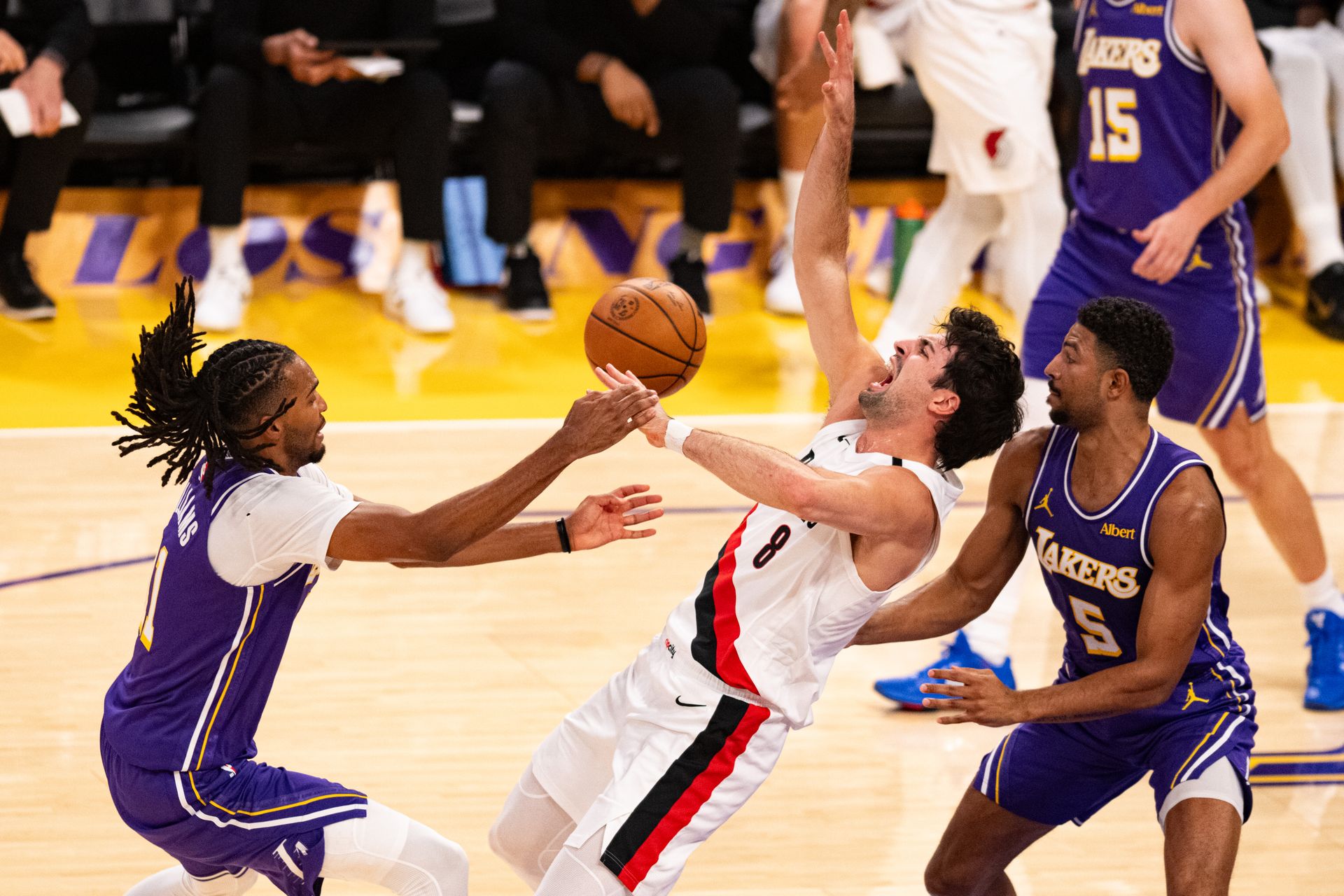 Deni Avdija draws a foul in the paint