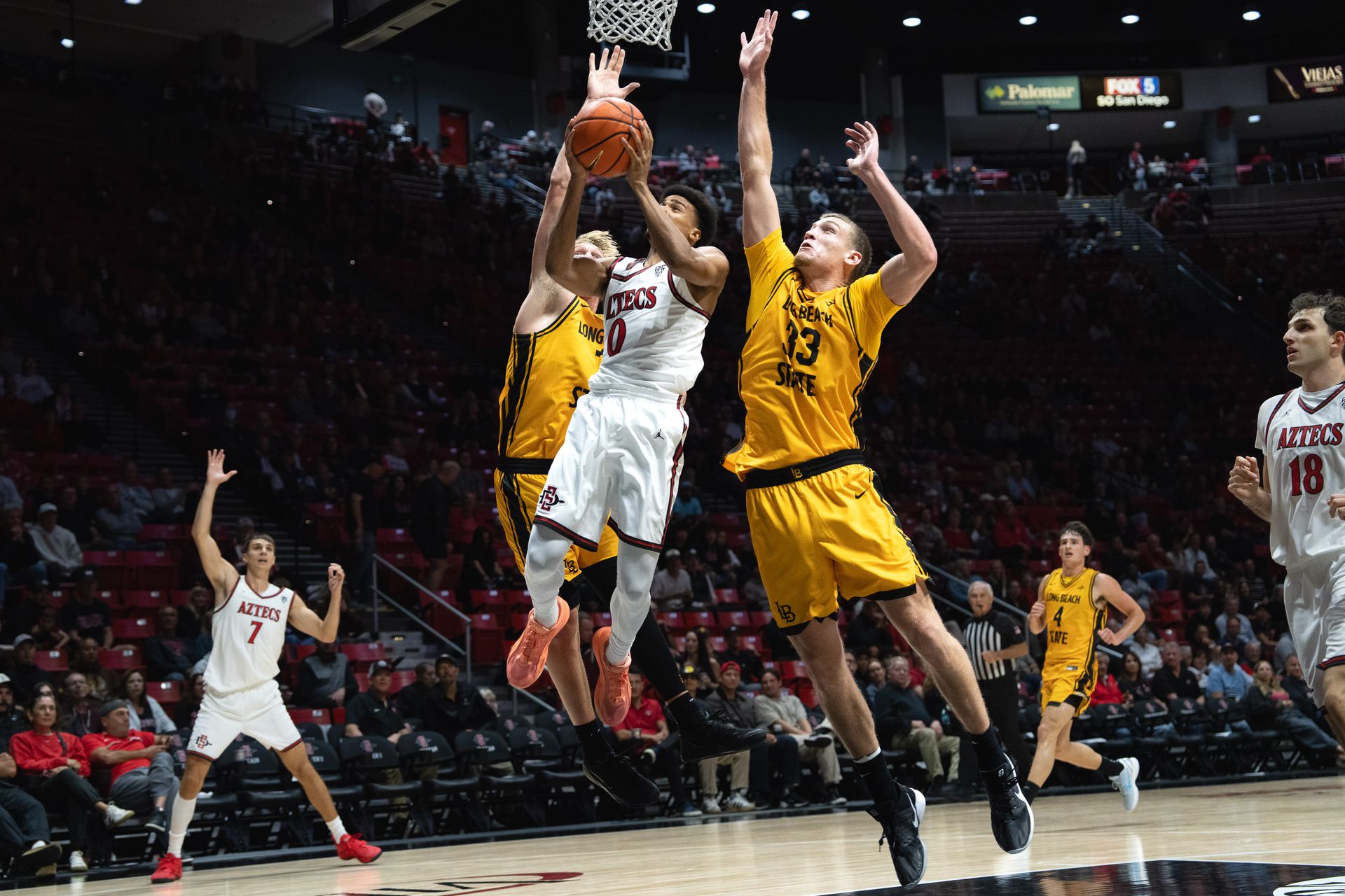 SDSU guard David Torresani attacks the rim for a layup