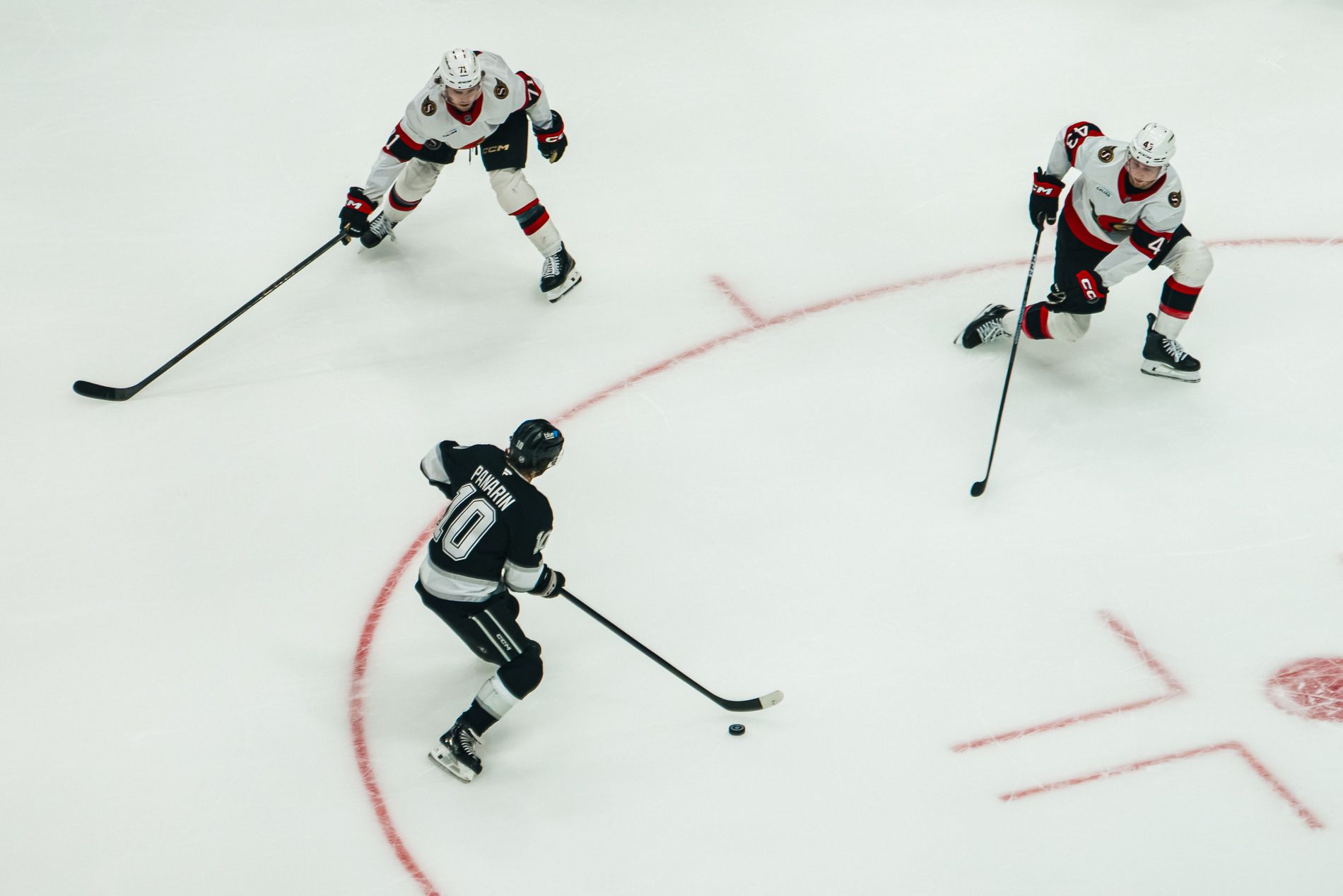 Artemi Panarin maneuvers through Ottawa defenders
