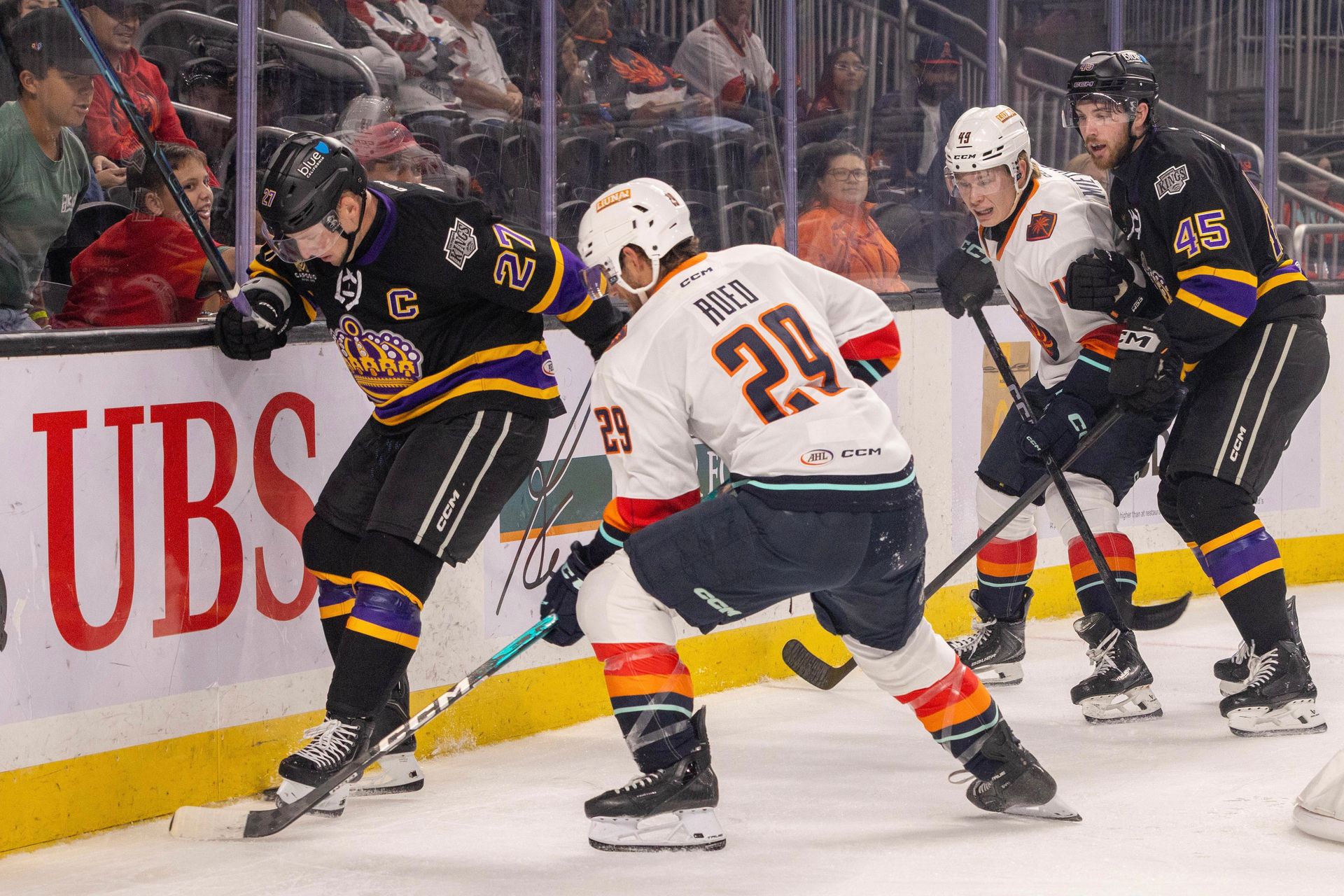 Lleyton Roed Battles Joe Hicketts Along the Boards