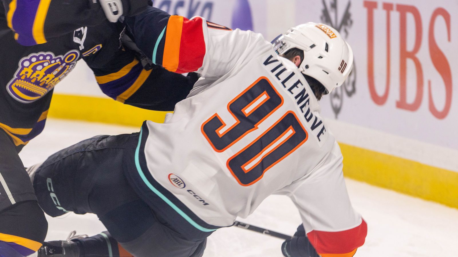 Nathan Villeneuve Battles for the Puck Against Ontario