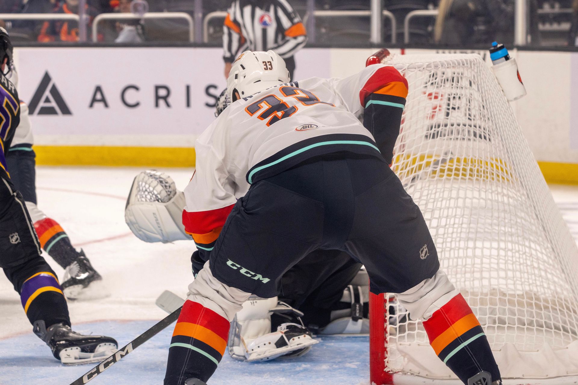 Jani Nyman Battles for Position Near the Ontario Net