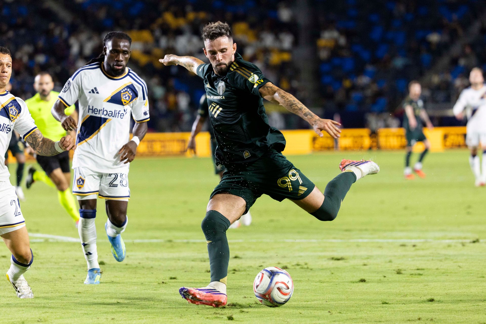 Kristoffer Velde advances the ball against LA Galaxy