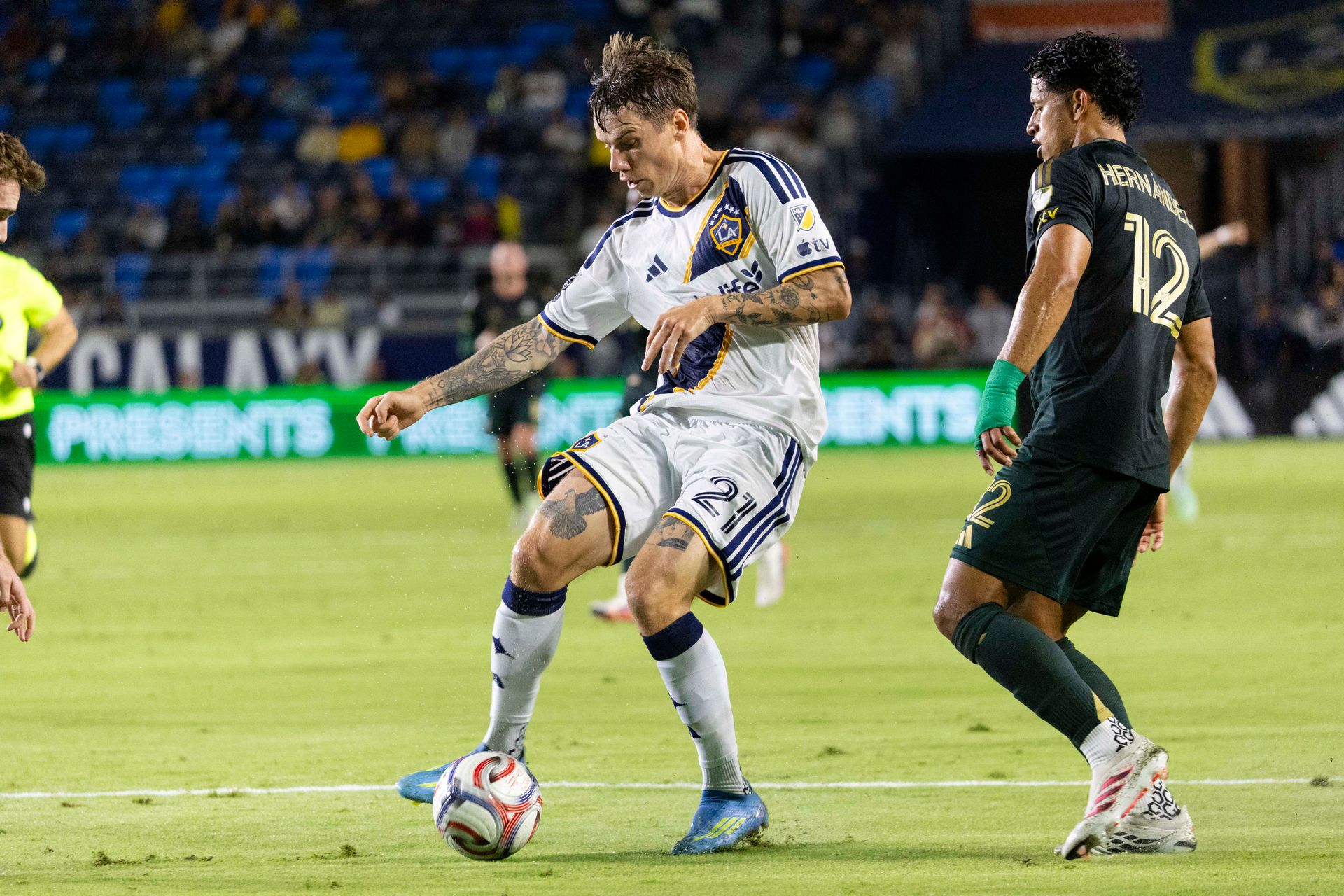 Robert Taylor advances the ball against the Timbers