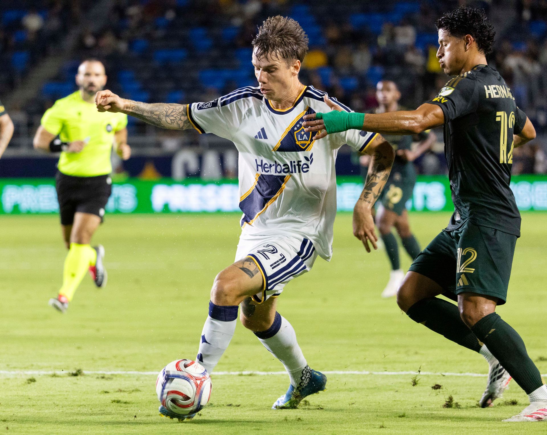 Robert Taylor carries the ball in LA Galaxy's win
